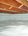 a moisture barrier installed on the walls and floors of a crawl space in Olive Branch