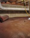 Crawl space drainage matting installed in a home in Booneville