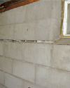 Severely buckling foundation walls in a home in Pontotoc in need of repairs.