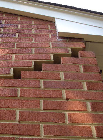 photo of a rotating foundation wall with cracks in Byhalia
