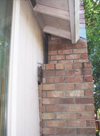sinking, leaning chimneys that are in danger of collapse in Covington