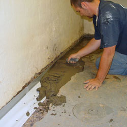 Testing a French drain system in a Millington home.