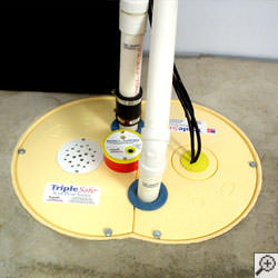 A sump pump system installed along a basement floor in Memphis.