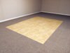 Tiled, carpeted, and parquet basement flooring options for basement floor finishing in Tupelo