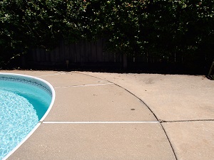 Sinking pool deck repaired with PolyLevel® concrete lifting