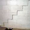 A diagonal stair step crack along the foundation wall of a Cabot home