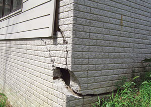 A severely damaged foundation wall in North Little Rock