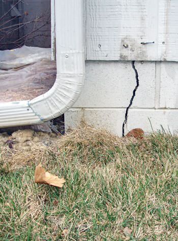foundation wall cracks due to street creep in Bryant
