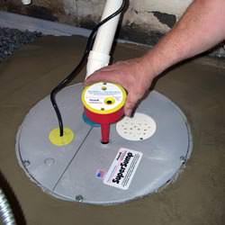 A newly installed sump pump system in a basement in Pine Bluff