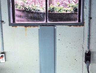 Repaired waterproofed basement window leak in North Little Rock